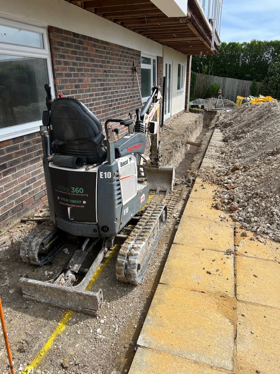 Mike 360 mini digger on ramps